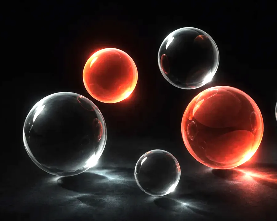 Six translucent spheres floating in dark space, two glowing warm and the rest inert